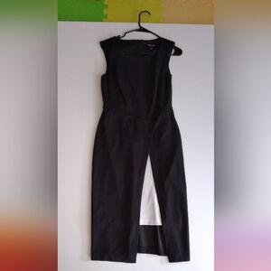 Elegant black dress with a little surprising detail